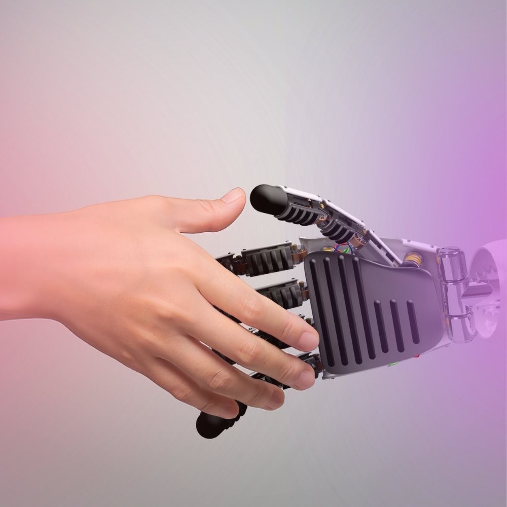 A human hand and a robotic hand reaching to shake
